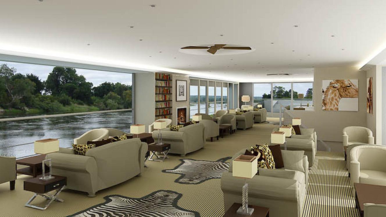 The Zambezi Queen houseboat sailing down the Chobe River.