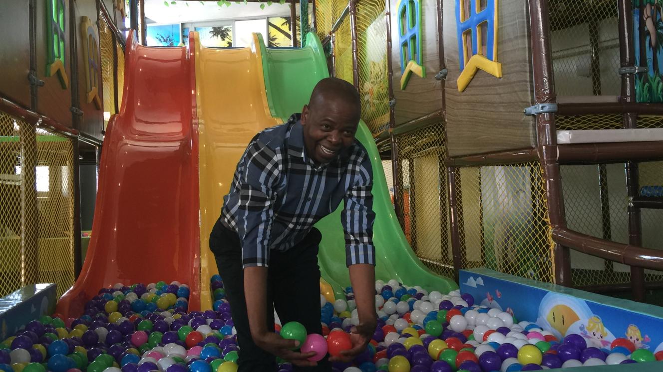 Head of Durban Tourism, Philip Sithole, in the ball pool at Durban’s new attraction, GO WiLD at the Wavehouse.