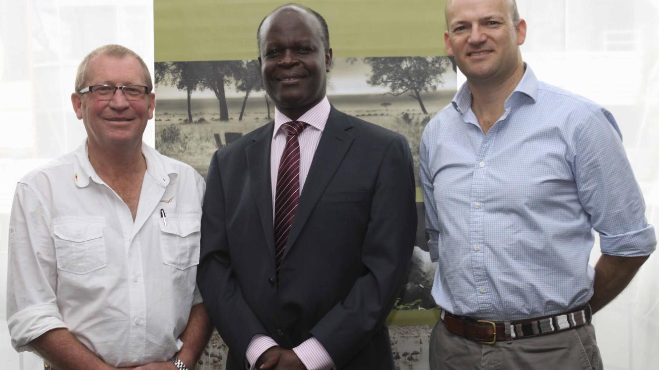 Keith Vincent, pictured with Desterio Oyatsi, Chairman of Governors’ Camp Collection and Dominic Grammaticas.