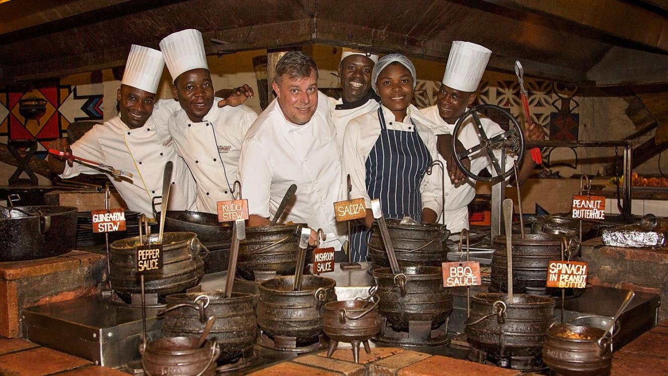 South African chef Arnold Tanzer with the culinary team at The Boma.