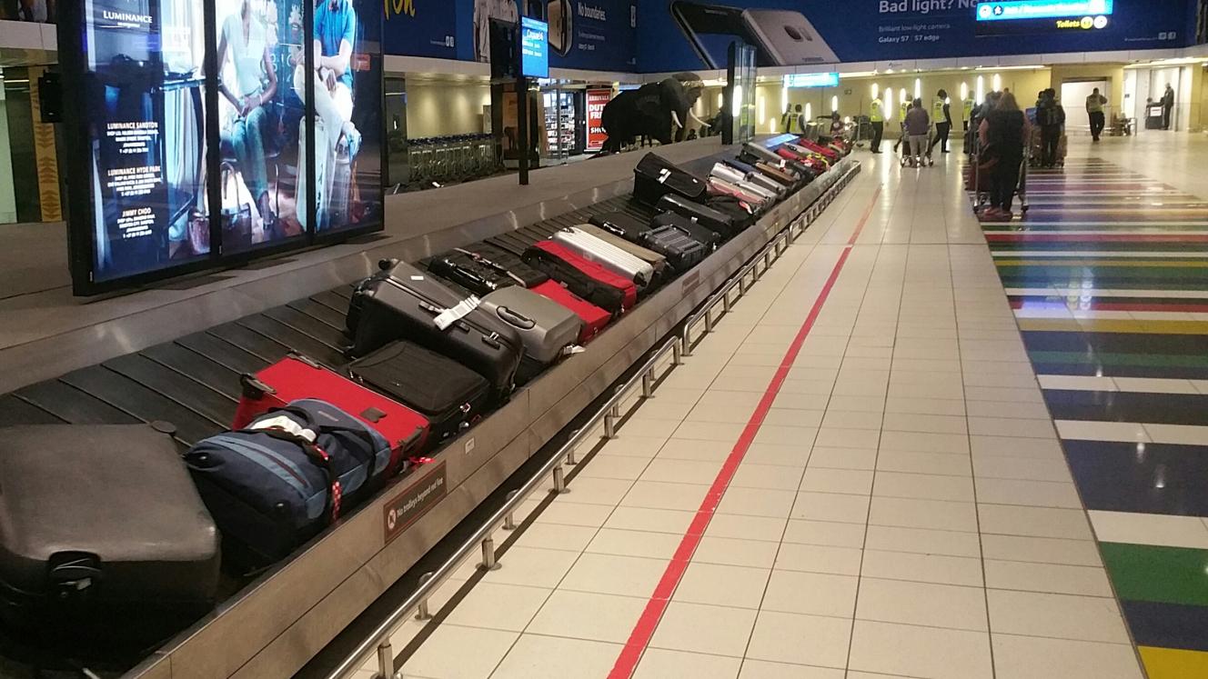 What is wrong with this picture? Every bag here represents an irate traveller to South Africa. South Africans have cleared immigration collected their bags and left the airport. Foreign passport holders will take up to two hours to get here, airlines report.