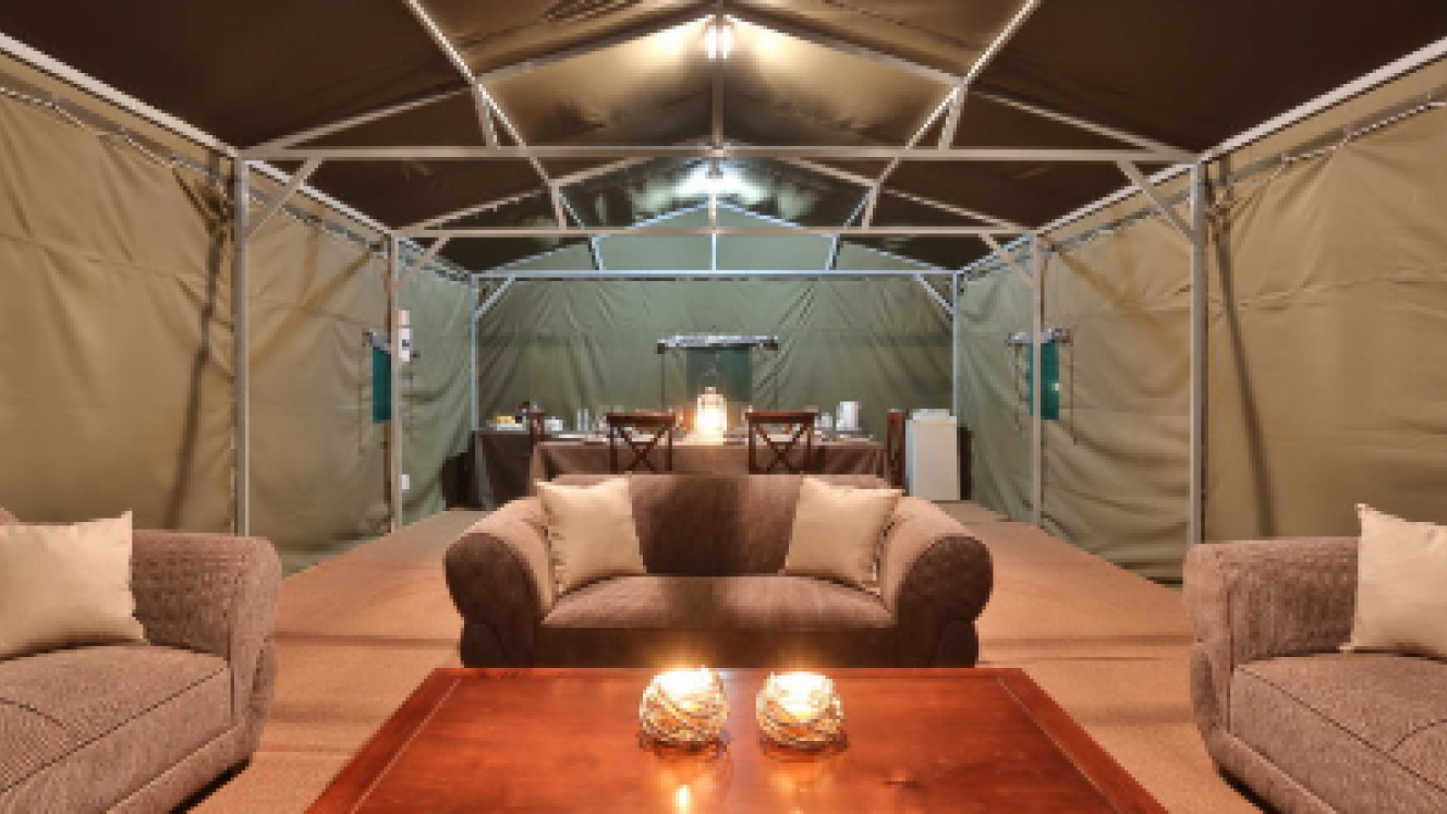 The tented lounge and dining area at Tented Adventures’ campsite in Pretoriuskop Rest Camp, Kruger.