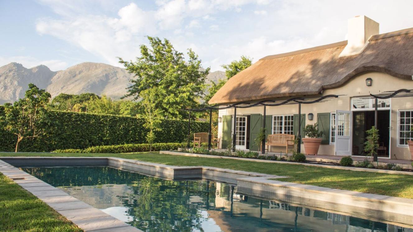 The property is on a working wine farm and is a five-minute walk from village restaurants and shops.