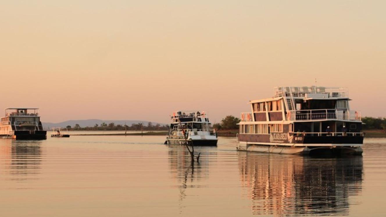 Zambezi Cruise & Safaris combines houseboat cruises with safari options.