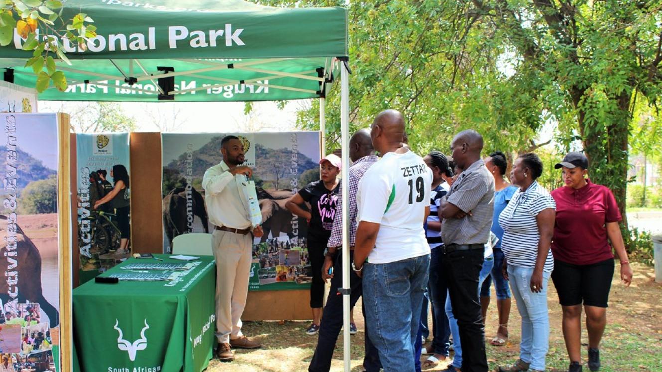 KNP’s Public Relations Assistant, Lesley Nyawo interacts with stakeholders at one of the Park’s outreach programmes.