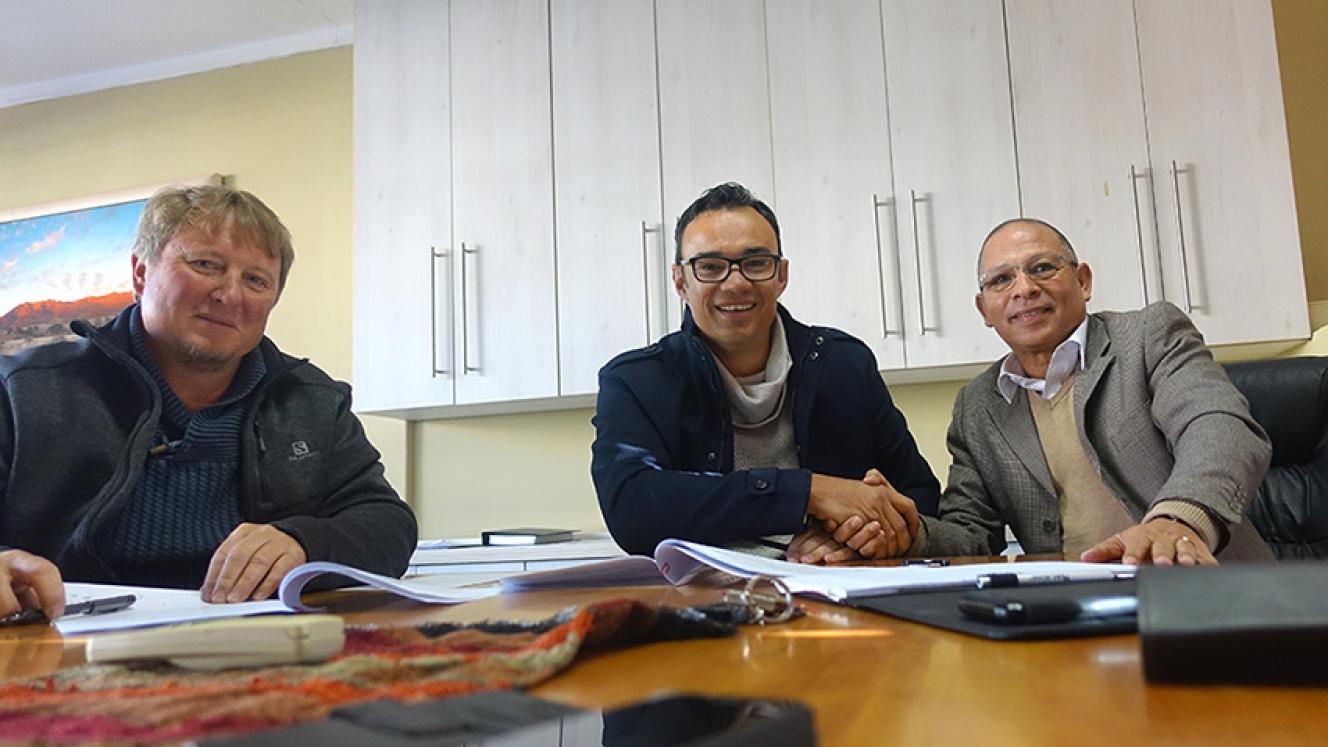 Gondwana Holdings Ltd sells 10% stake to Nam-mic Financial Services Holdings. From left: Jaco Visser and Gys Joubert (Gondwana Holdings) and Walter Don (NFSH).