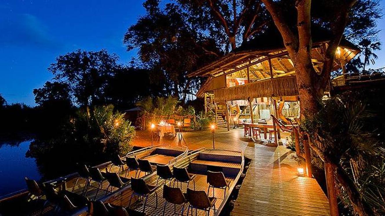 New main area with a floating fire deck, pool and jetty area.