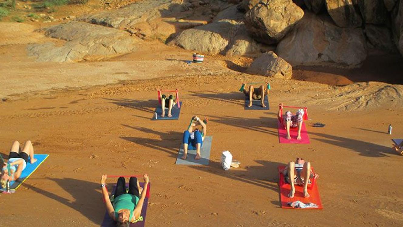 Pilates on the river bed. Image credit: The Safari Collection.