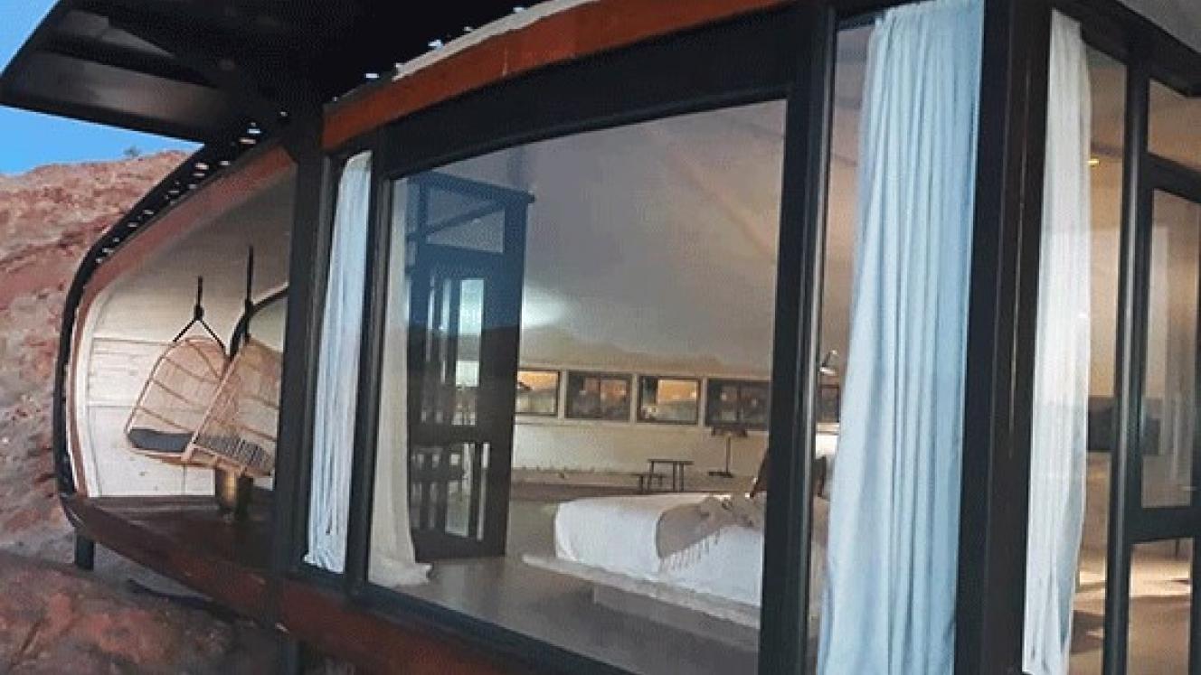 The bedroom and balcony at Desert Whisperer. 