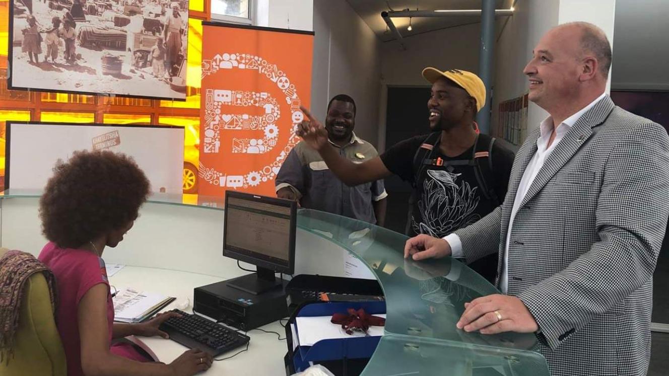 James Vos (pictured far right) at the Lookout Hill tourism centre in Khayelitsha.