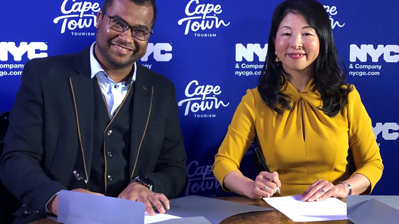 Renewing their marketing partnership at a signing ceremony in Cape Town:  Cape Town Tourism CEO, Enver Duminy, and NYC & Company MD Tourism Market Development, Makiko Matsuda Healy. Photo credit: Hilka Birns