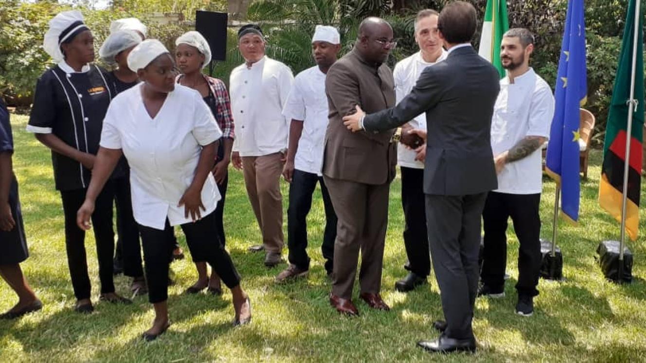 Minister of Tourism and Arts, Ronald Chitotela, and the Italian Ambassador to Zambia, Antonino Maggiore, are pictured with some of the local Zambian chefs undergoing training.