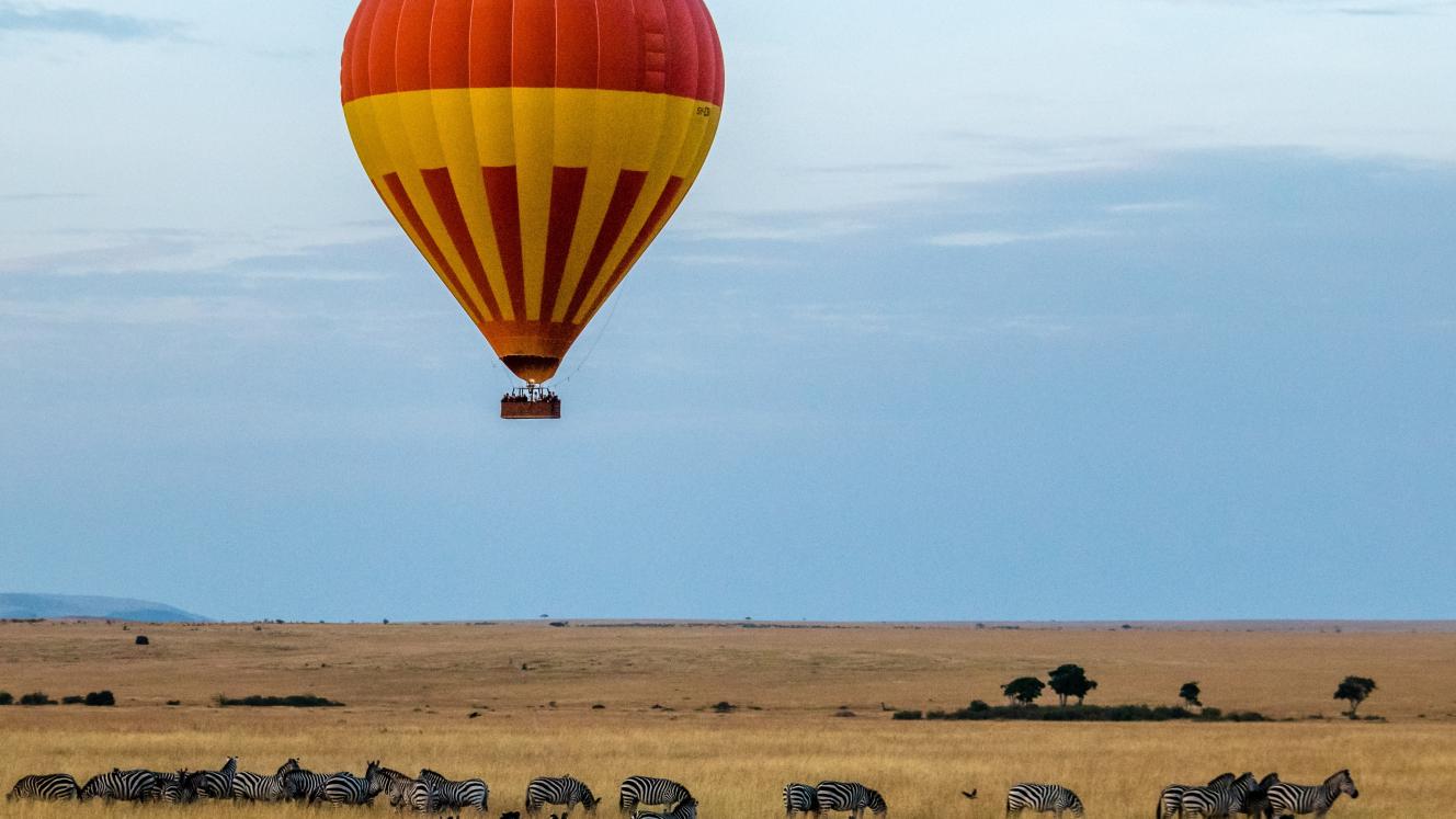 Hot-air balloon floating over the Maasai Mara