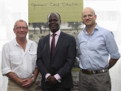 Keith Vincent, pictured with Desterio Oyatsi, Chairman of Governors’ Camp Collection and Dominic Grammaticas.
