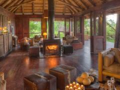 The nine tents at &Beyond Nxabega Okavango Tented Camp have been replaced with simple new structures with wide overhangs for shaded outdoor living.