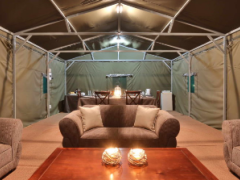 The tented lounge and dining area at Tented Adventures’ campsite in Pretoriuskop Rest Camp, Kruger.