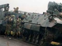 Tourism continues in Zimbabwe despite military presence. 