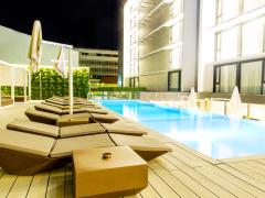 Relax in luxury by the poolside