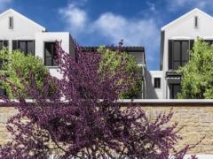 The Am Weinberg Boutique Hotel encompasses a heritage building, creating an inviting courtyard.