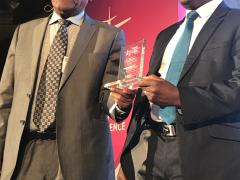 Former Ethiopian Airlines CEO and former RwandAir chairman, Girma Wake, presents IATA VP for Africa, Raphael Kuuchi, with a life-time achievement award at the AviaDev conference in Cape Town.