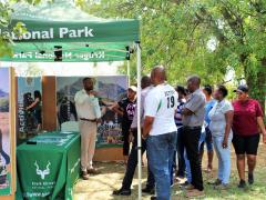 KNP’s Public Relations Assistant, Lesley Nyawo interacts with stakeholders at one of the Park’s outreach programmes.