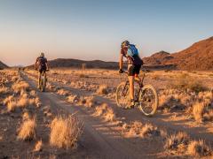 Visitors to Sossus Under Canvas can see some of Namibia’s best sights by bike. 