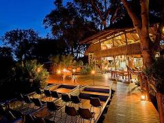 New main area with a floating fire deck, pool and jetty area.