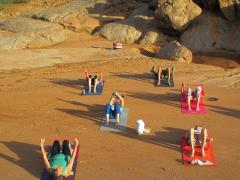 Pilates on the river bed. Image credit: The Safari Collection.