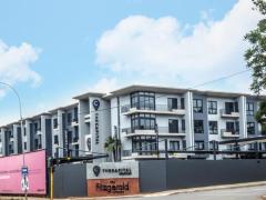 Across the road from the retail hub of Melrose Arch.