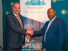 Alderman James Vos being congratulated by Cape Town Mayor, Dan Plato.