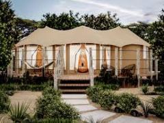 Each tent has a private balcony overlooking the Talek river.