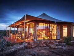 Elewana Loisaba Lodo Springs offers a private experience, with eight individual tented rooms, each with its own colour scheme.