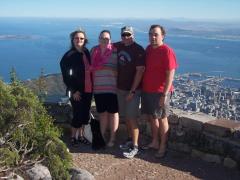Tourists pictured on Table Mountain as part of a Melberry African Tours excursion.