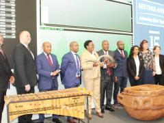 The Minister of Tourism opening trade at the JSE by blowing the kudu horn